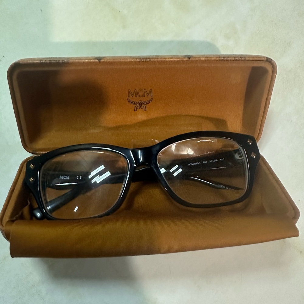MCM black and Gold frames nearly new condition with original case.